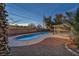 Private backyard pool with desert landscape, offering a relaxing retreat at 3731 Spencer St, Las Vegas, NV 89119