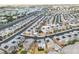 The aerial view showcases the neighborhood's well-planned layout and the solar panels on the houses at 3771 Bright Aquarius Ln, Henderson, NV 89052