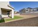 View of the home's backyard with a rock lawn and turf at 3771 Bright Aquarius Ln, Henderson, NV 89052