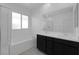 Modern bathroom featuring double sinks, a soaking tub, a walk-in shower, and a large window at 3771 Bright Aquarius Ln, Henderson, NV 89052