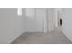 Bedroom featuring a large closet, white walls, neutral carpet, and access to the en suite bathroom at 3771 Bright Aquarius Ln, Henderson, NV 89052