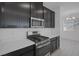 Close up of modern kitchen with stainless steel microwave and stove at 3771 Bright Aquarius Ln, Henderson, NV 89052