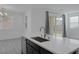 Kitchen island features stainless steel dishwasher and sink at 3771 Bright Aquarius Ln, Henderson, NV 89052
