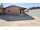 Large, empty backyard offers plenty of potential for outdoor living and landscaping at 3856 Commanche Ave, Las Vegas, NV 89121