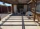 Covered backyard patio with outdoor seating and plenty of space for entertaining at 3856 Commanche Ave, Las Vegas, NV 89121