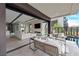 Expansive backyard with patio seating, pool, and easy access to the home's modern living areas, creating a perfect outdoor retreat at 42 Lakefront Dr, Henderson, NV 89011