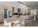 Modern kitchen boasts stainless steel appliances, custom cabinetry, and sleek countertops at 42 Lakefront Dr, Henderson, NV 89011