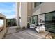 Inviting patio with comfortable seating, stylish pavers, and seamless access to the modern interior at 42 Lakefront Dr, Henderson, NV 89011