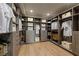 Spacious walk-in closet with custom shelves and drawers, offering ample storage and organization at 42 Lakefront Dr, Henderson, NV 89011