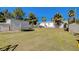 Spacious backyard with a storage building, trampoline, and lush green grass at 425 Bonelli Ave, Overton, NV 89040