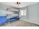 room featuring triple bunk beds, a storage dresser, and plenty of space at 425 Bonelli Ave, Overton, NV 89040
