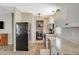 Galley kitchen with stainless steel appliances, gray and white countertops, and bright white cabinets at 425 Bonelli Ave, Overton, NV 89040