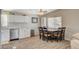 Open concept kitchen and dining room with stainless steel appliances and wood flooring at 425 Bonelli Ave, Overton, NV 89040