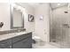 Bathroom with a vanity with granite countertop and tiled shower at 4575 Dean Martin Dr # 1103, Las Vegas, NV 89103