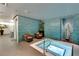 Enjoy the benefits of this community hot tub with tiling, accent lighting and even chairs for relaxing at 4575 Dean Martin Dr # 1103, Las Vegas, NV 89103