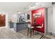 Open concept kitchen and dining area with granite counters and modern grey cabinets at 4575 Dean Martin Dr # 1103, Las Vegas, NV 89103