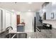 Modern kitchen featuring granite countertops, light gray cabinets and stainless steel appliances at 4575 Dean Martin Dr # 1103, Las Vegas, NV 89103