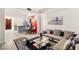 Open-concept living room with modern decor, a view of the kitchen, and a comfortable seating area at 4575 Dean Martin Dr # 1103, Las Vegas, NV 89103
