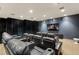 Home theater with plush leather seating and large screen for the ultimate movie watching experience at 4575 Dean Martin Dr # 1103, Las Vegas, NV 89103