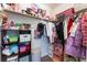 Closet with rod, shelves, toys, and clothing at 4708 Royal Sunset Ct, Las Vegas, NV 89130