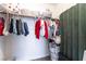 Walk-in closet with rod, shelves, and green curtain at 4708 Royal Sunset Ct, Las Vegas, NV 89130
