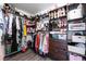 Walk-in closet with built-in shelving and organizers, perfect for maximizing storage and displaying shoes and clothes at 4708 Royal Sunset Ct, Las Vegas, NV 89130