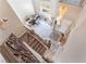Grand foyer with staircase, chandelier, tile floors, and a view of the dining area creates a stunning first impression at 4708 Royal Sunset Ct, Las Vegas, NV 89130