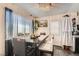This dining area has a large table and a unique chandelier, perfect for Gathering meals at 4944 Rita Dr, Las Vegas, NV 89121