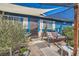 Quaint front porch featuring a covered seating area and a swing at 4944 Rita Dr, Las Vegas, NV 89121