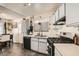 A spacious kitchen with stainless steel appliances and plenty of counter space for meal preparation at 4944 Rita Dr, Las Vegas, NV 89121