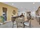 Open-concept dining area with modern decor, seamlessly connected to the kitchen and living space at 5095 E Long Leaf Ct, Pahrump, NV 89061