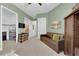 Comfortable living room featuring a brown sofa and a wooden cabinet at 5095 E Long Leaf Ct, Pahrump, NV 89061