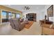 Spacious living room with comfortable seating, built-in shelving, and lots of natural light at 5095 E Long Leaf Ct, Pahrump, NV 89061