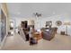 Inviting living room featuring plush leather seating, stylish decor, and bright natural light at 5095 E Long Leaf Ct, Pahrump, NV 89061