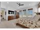 Bright main bedroom with large windows and a comfortable bed, perfect for relaxation at 5095 E Long Leaf Ct, Pahrump, NV 89061