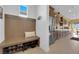 Functional mud room and kitchen with stainless steel appliances and ample storage at 5095 E Long Leaf Ct, Pahrump, NV 89061