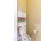 Bathroom featuring a toilet with overhead storage and modern fixtures at 5350 Tulip Hill Ave, Las Vegas, NV 89141