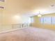 Spacious bonus room with neutral carpet and a view of the staircase at 5350 Tulip Hill Ave, Las Vegas, NV 89141
