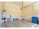 Spacious two-car garage with storage space, water heater, and clean epoxy flooring at 5350 Tulip Hill Ave, Las Vegas, NV 89141
