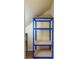 Unfinished storage space featuring shelving units and open space at 5350 Tulip Hill Ave, Las Vegas, NV 89141
