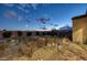 Serene backyard at dusk, showcasing a brick pathway, meticulously arranged plants, and decorative landscaping features at 6333 Orto Vaso Ave, Las Vegas, NV 89131