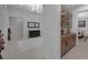 Inviting entryway featuring tile flooring, custom cabinets, and a view of the dining area, creating a warm welcome to the home at 6333 Orto Vaso Ave, Las Vegas, NV 89131