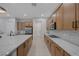 Well-equipped kitchen featuring stainless steel appliances, a gas cooktop, granite countertops, and ample storage space at 6333 Orto Vaso Ave, Las Vegas, NV 89131