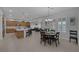 Spacious open-concept kitchen with island, breakfast bar, and dining area perfect for entertaining and Gathering gatherings at 6333 Orto Vaso Ave, Las Vegas, NV 89131