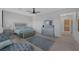 This primary bedroom offers a spacious layout, lots of natural light, and calming neutral color palettes at 6333 Orto Vaso Ave, Las Vegas, NV 89131