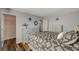Serene bedroom showcasing a full dresser, and a calming aesthetic, ideal for relaxation and restful nights at 7018 Hunts Corner St, Las Vegas, NV 89166