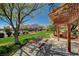 Community park featuring a picnic table under a pergola for outdoor enjoyment at 7018 Hunts Corner St, Las Vegas, NV 89166