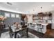 Beautiful kitchen with stainless appliances, hardwood floors, island, and breakfast bar at 7018 Hunts Corner St, Las Vegas, NV 89166