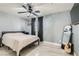 Relaxing bedroom with a ceiling fan, neutral walls, and plenty of natural light at 720 Camino La Paz, Henderson, NV 89012