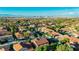 Scenic aerial view of the property with a view of the mountains in the background at 7427 Tomahawk Bend Ave, Las Vegas, NV 89113